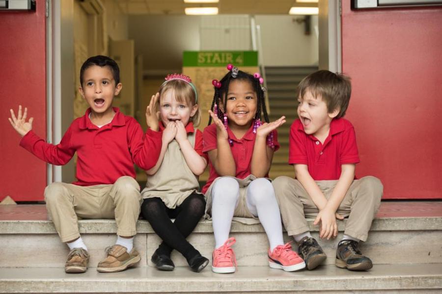Applying to PK3 and PK4 Programs PK students in red uniform